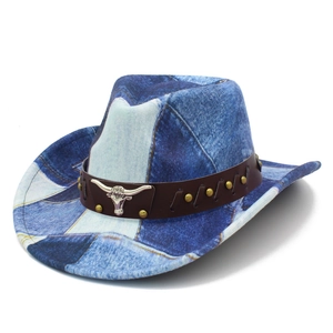 Detail of vintage tie-dye denim cowboy hat with leather band and silver bull head icon