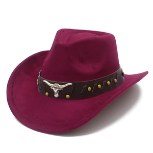 Detail of burgundy faux suede cowboy hat with brown leather band and silver bull head icon