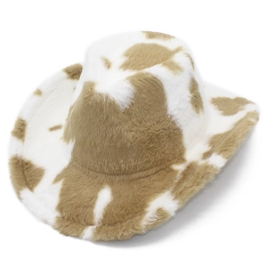 Detailed texture of plush cowboy hat featuring khaki and white cow print patterns