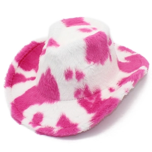 Detail of pink cow print plush western cowboy hat showing soft faux fur texture