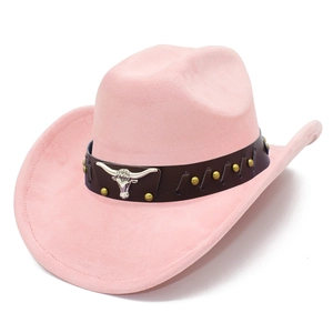 Detail view of pink suede jazz hat with bull head emblem and vintage gold studs