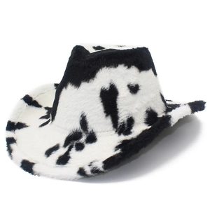 Plush faux fur cowboy hat with stylish black and white cow print for winter warmth