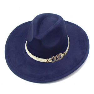 Detailed view of deep blue fedora hat with white braided rope and golden buckle