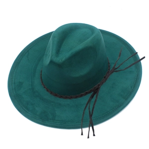 Close-up of dark green felt fedora with a brown braided leather band and side tassel
