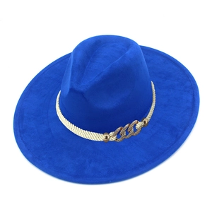 Detail of royal blue fedora hat with cream braided rope and gold metal chain links