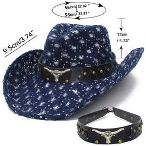 Close-up of distressed denim cowboy hat with bull head buckle and detailed size chart