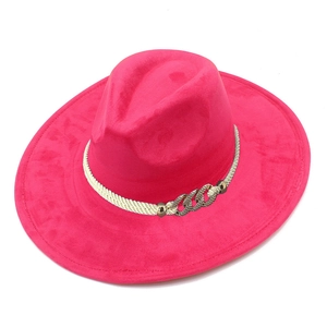 Detail of rose red suede fedora with braided rope and gold-silver metal chain accent