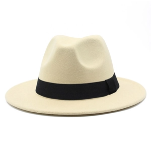 Close-up of beige wool fedora hat with black grosgrain ribbon and classic crown