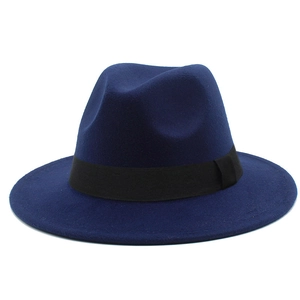 Close-up detail of dark blue wool felt fedora hat featuring a black grosgrain ribbon band