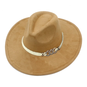 Detail of camel wide brim felt hat featuring white braided rope and bronze metal buckle