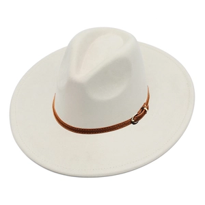 Detailed close-up of wide brim suede fedora hat with brown leather strap and gold buckle