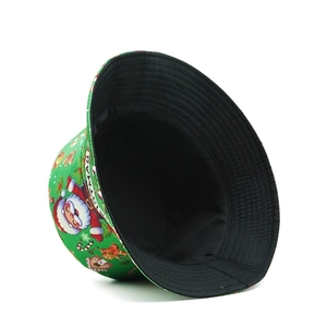 Detail of Christmas bucket hat featuring Santa, gingerbread man print and fine stitching