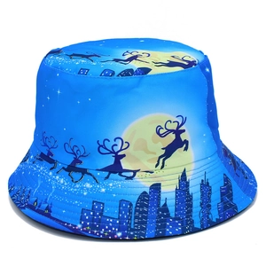 Sky blue Christmas bucket hat with reindeer and yellow moon winter landscape pattern