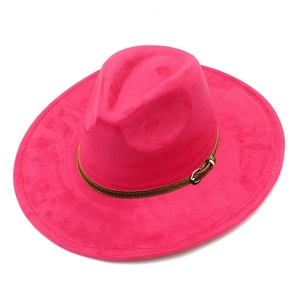 Detail of fuchsia wide brim fedora with suede texture and leather strap buckle
