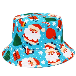 Close-up of light blue bucket hat with all-over Christmas icons and penguin pattern