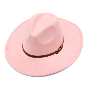 Detail of pink faux suede fedora hat with wide brim and adjustable brown leather band