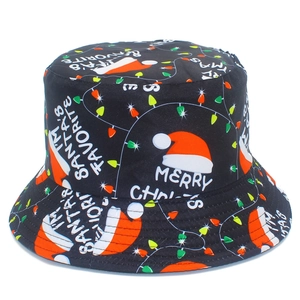 Detail of Christmas bucket hat featuring festive Santa and Merry Christmas prints