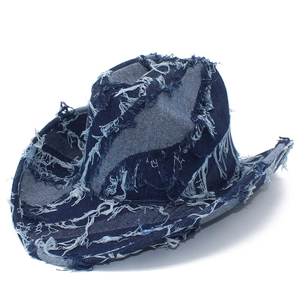 Distressed dark blue denim cowboy hat with fringe details and retro street style design