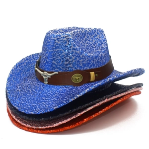 Sparkly sequin cowboy hats in blue, black, pink, and orange with decorative metal bull studs