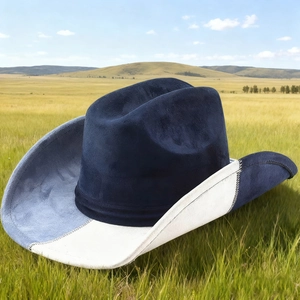 Detail of multi-color patchwork suede cowboy hat showing fine stitching and classic textures