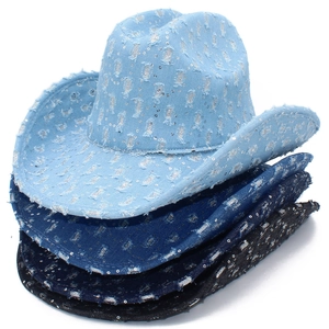 Close-up of distressed denim cowboy hats with sequins in light blue, dark blue, and black