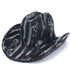 Distressed vintage navy denim cowboy hat with torn details and classic wide curved brim
