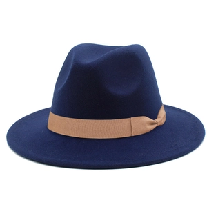 Detail of navy blue felt fedora hat with khaki decorative ribbon and bow accent