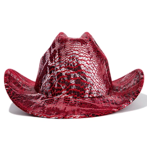 Detailed view of the vibrant red, silver and black snakeskin texture on a western cowboy hat