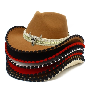 Detail view of multi-color felt cowboy hats with cattle skull buckles and stitched brims