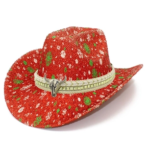 Christmas cowboy hat in red with white snowflakes and a silver bull head metal emblem