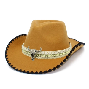 Classic camel felt western cowboy hat with silver bull head accessory and studded band