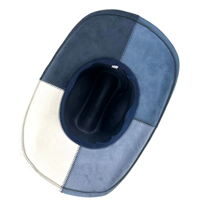 Detail of multi-color patchwork cowboy hat featuring premium faux suede and inner sweatband
