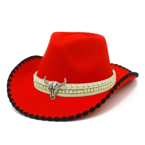 Red western cowboy hat with silver longhorn pendant and gold studded woven band