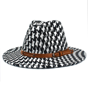 Classic houndstooth fedora hat with brown faux leather belt and metal buckle detail