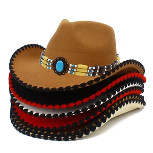 Close-up of stacked western cowboy hats with turquoise beads and stitched brim detail