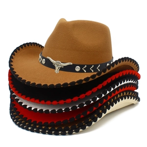 Detail of western cowboy hats with metallic bull head studs and contrast stitching