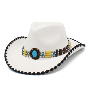 Classic white cowboy hat with ethnic bead band and vintage blue stone ornament