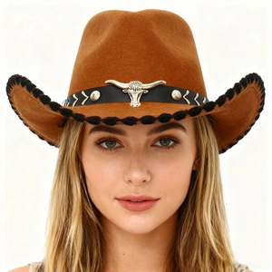 Brown western cowboy felt hat with silver bull head accessory and black woven edges