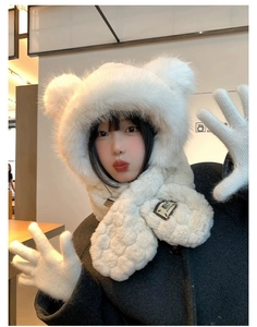 Detail of white faux fur bear ear hood scarf set with soft plush texture and matching gloves