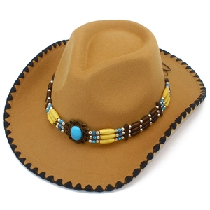Close-up of camel wool felt cowboy hat with ethnic beads, turquoise and wavy stitching