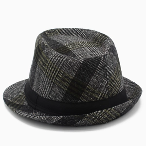Close-up of British style wool plaid fedora hat with elegant black grosgrain ribbon trim