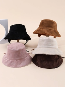 Detail showing five colors of suede bucket hats with warm faux shearling lining