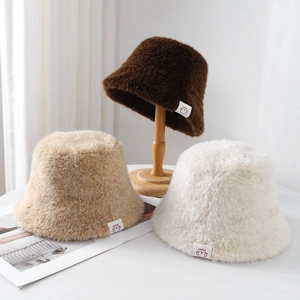 Plush faux fur bucket hats in brown and beige with cute teddy bear patches