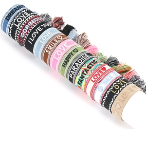Colorful hand-woven embroidery tassel bracelets with LOVE lettering and ethnic patterns