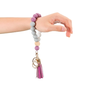 Silicone bead keychain bracelet with purple tassels, wooden bead and golden lobster clasp