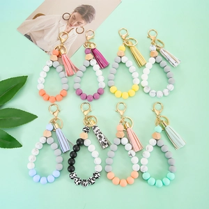 Chic silicone bead wristlet keychain with wooden bead, tassel, and lobster clasp in 8 colors
