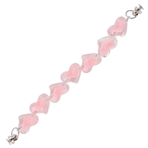 Macro detail of pink translucent heart-shaped beads with silver metal clasps and rings