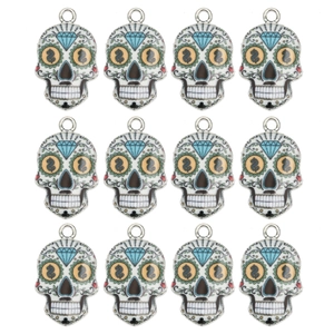 Detailed set of twelve colorful skull charms with Mexican Day of the Dead enamel patterns