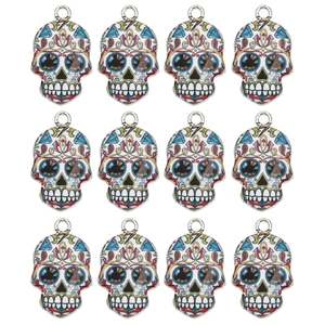 Set of twelve colorful sugar skull pendants with enamel details and silver hanging rings