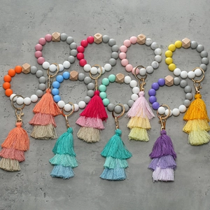 Silicone bead keychain bracelets with tiered tassels in multiple vibrant color sets